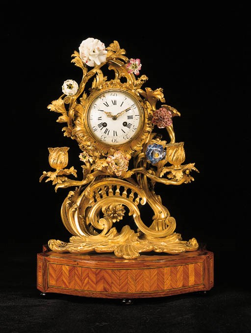 A LOUIS XV FRENCH PORCELAIN-MOUNTED ORMOLU TWIN-BRANCH MANTEL CLOCK