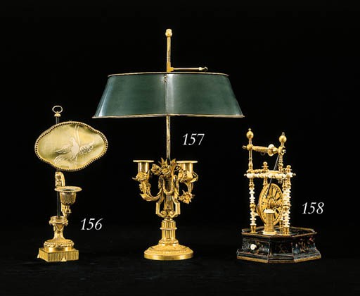 A LOUIS XVI ORMOLU CANDLESTICK