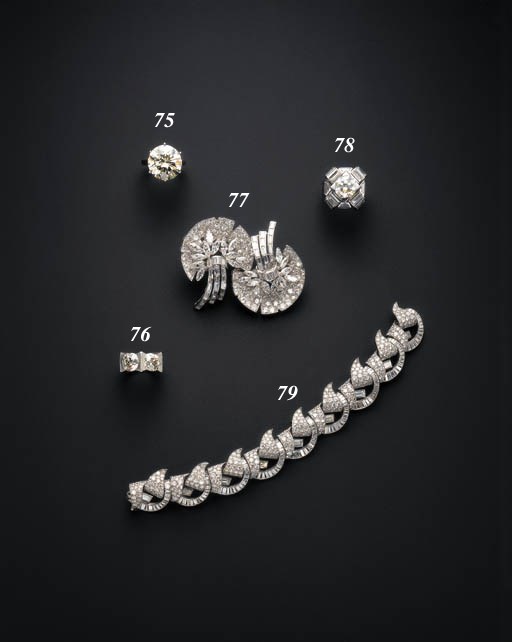 AN ELEGANT ART DECO DIAMOND TWO-STONE RING, CARTIER