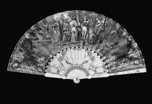 Rebecca and Eliezer at the Well, a painted fan, the ivory sticks carved with figures and pierced - 10in. (26cm.), English, circa 1760 See Illustration