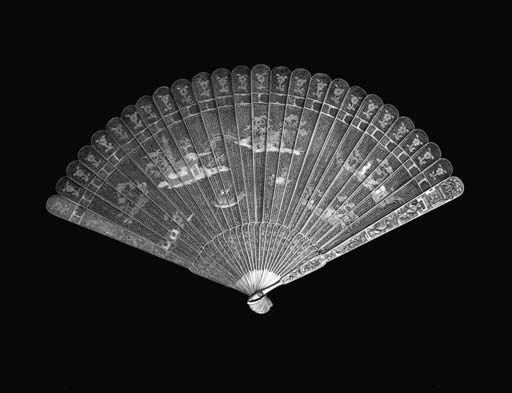 A Canton filigree fan, enamelled in blue, green, yellow and brown, both recto and verso with a pagoda and other buildings on islands, and figures in boats - 8in. (20cm.), circa 1820