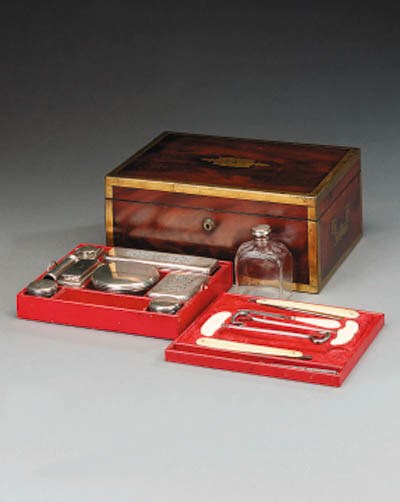 A Regency brass bound mahogany dressing table box, circa 1825