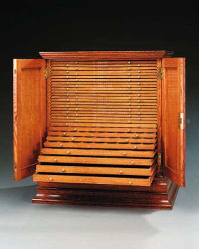 A Victorian oak coin collector's cabinet, second half 19th century