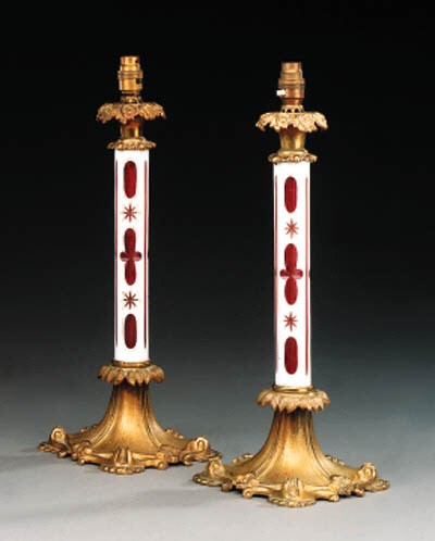 A pair of late Victorian gilt bronze mounted bohemian glass table lamps, late 19th century