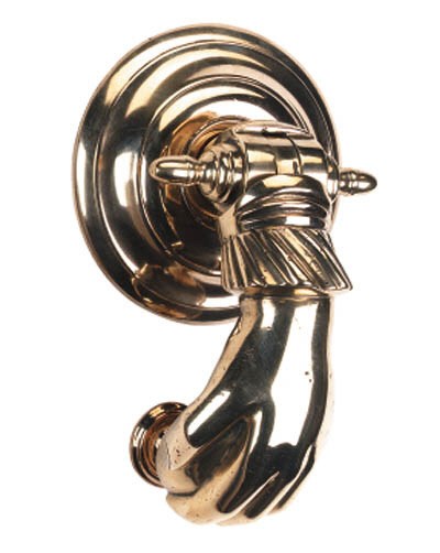 A Victorian brass door knocker