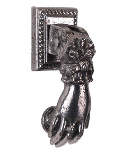 A Victorian steel door knocker
