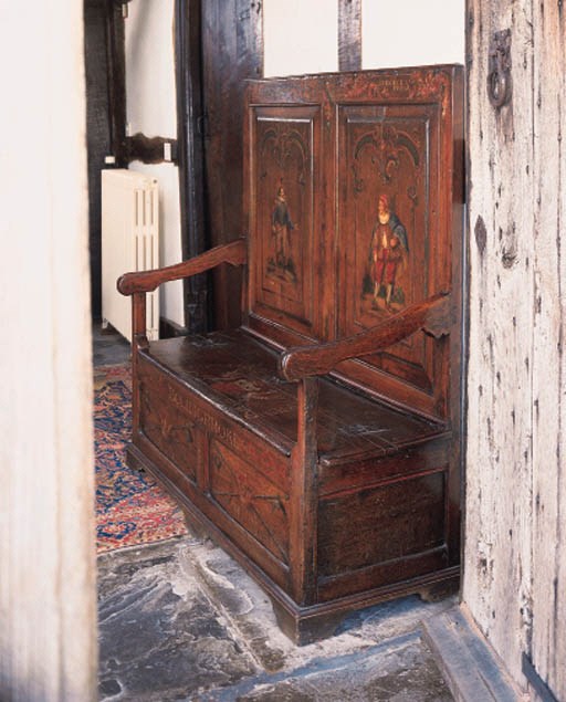 An oak panelled box seat settle, probably Welsh, 18th century