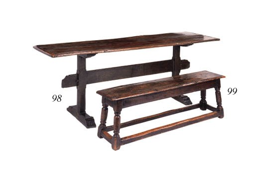 An oak long stool, English, early 20th century