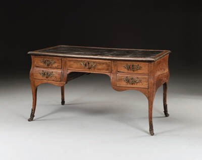 A LOUIS XV PROVINCIAL ORMOLU-MOUNTED FRUITWOOD BUREAU-PLAT