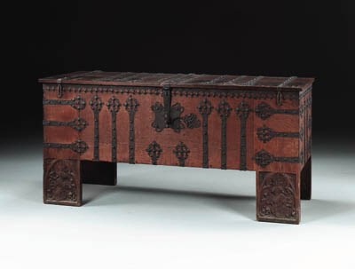 A GERMAN RENAISSANCE WROUGHT-IRON-MOUNTED OAK COFFER