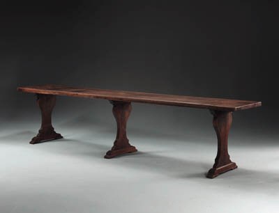 AN ITALIAN BAROQUE WALNUT REFECTORY TABLE