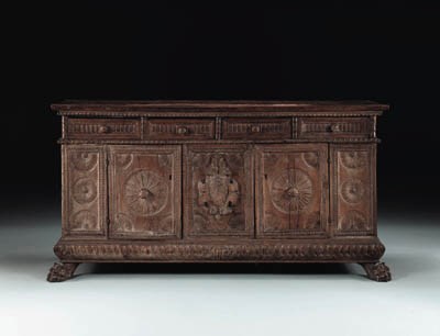 AN ITALIAN RENAISSANCE WALNUT CREDENZA