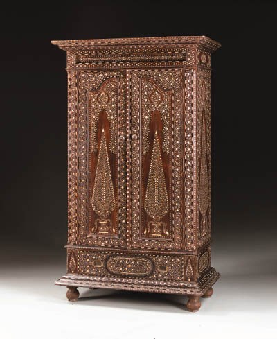 A COLONIAL IVORY AND EBONY-INLAID HARDWOOD ARMOIRE