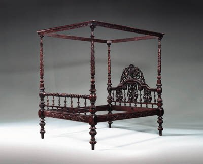 A COLONIAL PARCEL-GILT AND STAINED HARDWOOD FOUR-POSTER BED
