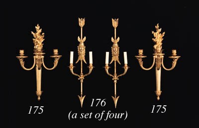 A SET OF FOUR EMPIRE STYLE ORMOLU TWIN-BRANCH WALL-LIGHTS