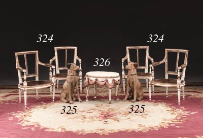 A PAIR OF FRENCH POLYCHROME-METAL PEINT DOGS