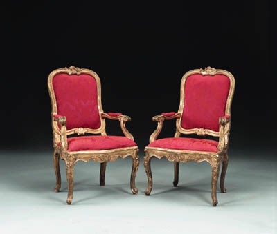 A PAIR OF ITALIAN ROCOCO GILTWOOD ARMCHAIRS