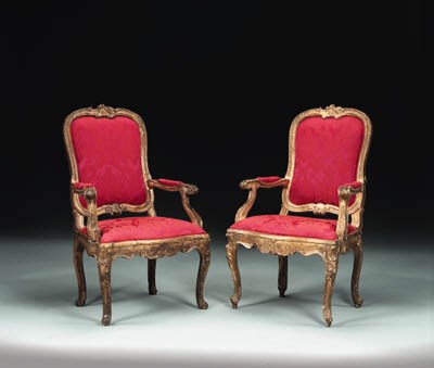 A PAIR OF ITALIAN ROCOCO GILTWOOD ARMCHAIRS