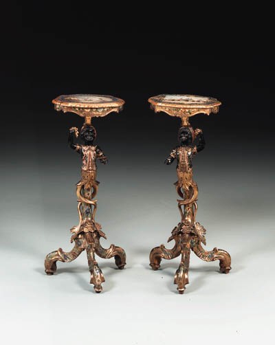 A PAIR OF ITALIAN ROCOCO STYLE PARCEL-GILT AND POLYCHROME-PAINTED BLACKAMOOR TABLES