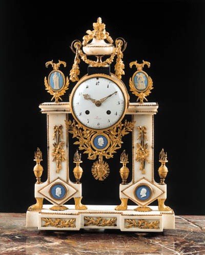 A Louis XVI ormolu-mounted jasperware mantel clock