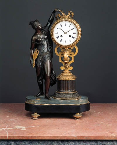A Louis Phillipe bronze and ormolu mantel clock