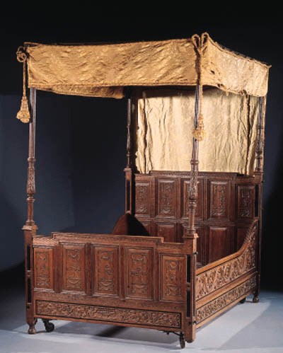 A Dutch oak and ebony four posted bed