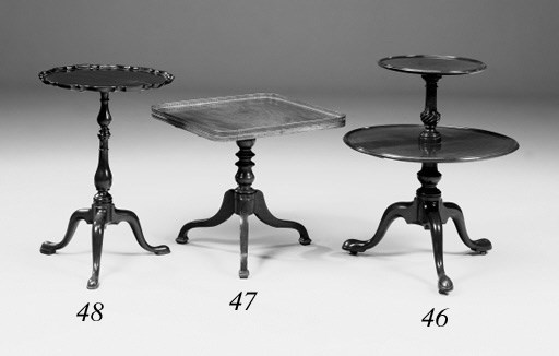 A mahogany two tier dumb waiter, parts 18th century
