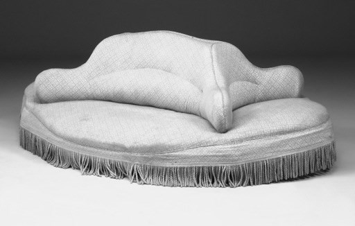 A large conversation settee, late 19th/early 20th century
