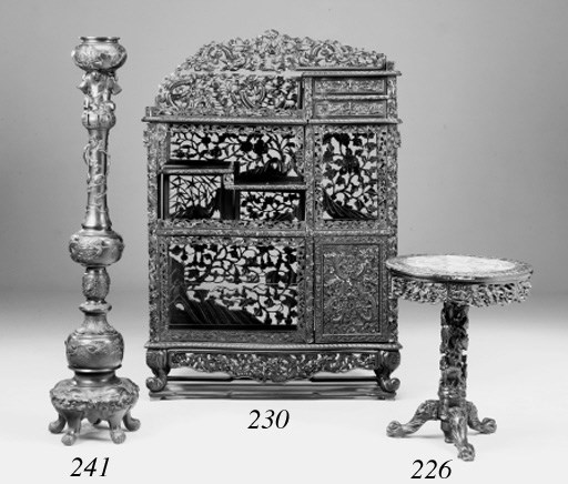 An Oriental carved hardwood shadona, early 20th century