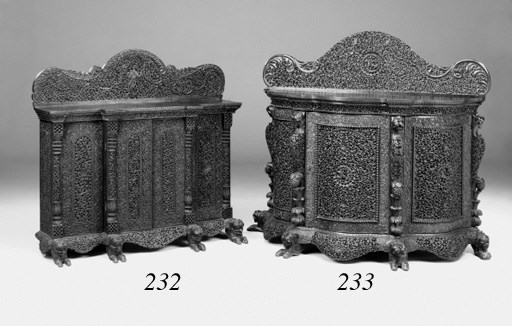 A far Eastern carved hardwood breakfront side cabinet, late 19th century