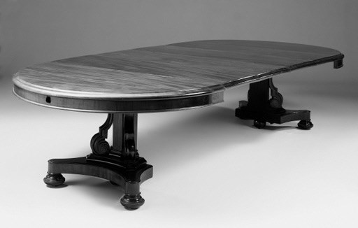A Victorian mahogany extending dining table