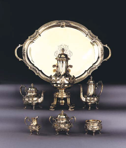 A FRENCH SILVER SIX-PIECE TEA AND COFFEE SERVICE AND TRAY**