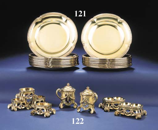 A FRENCH SILVER-GILT EIGHT-PIECE CONDIMENT SERVICE