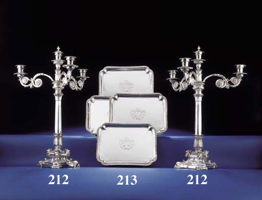 A SET OF FOUR GEORGE III SILVER FOOTED SALVERS