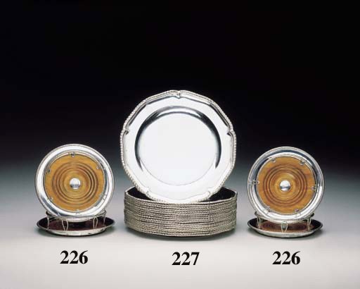 A SET OF EIGHTEEN GEORGE III SILVER DINNER PLATES