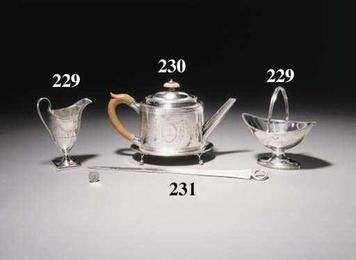 A GEORGE III SILVER SUGAR BASKET AND CREAM JUG