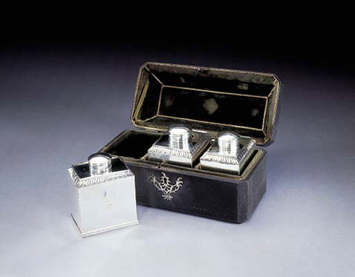 A PAIR OF GEORGE III SILVER TEA CADDIES AND A SUGAR BOX IN SHAGREEN CASE