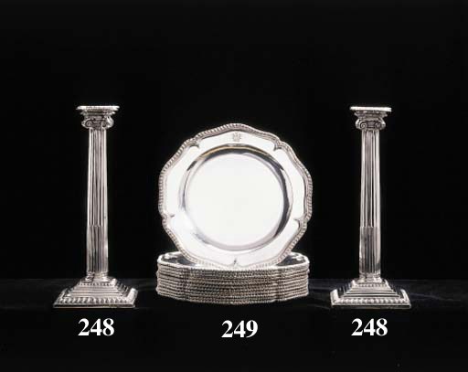 A SET OF TWELVE GEORGE III SCOTTISH SILVER DINNER PLATES
