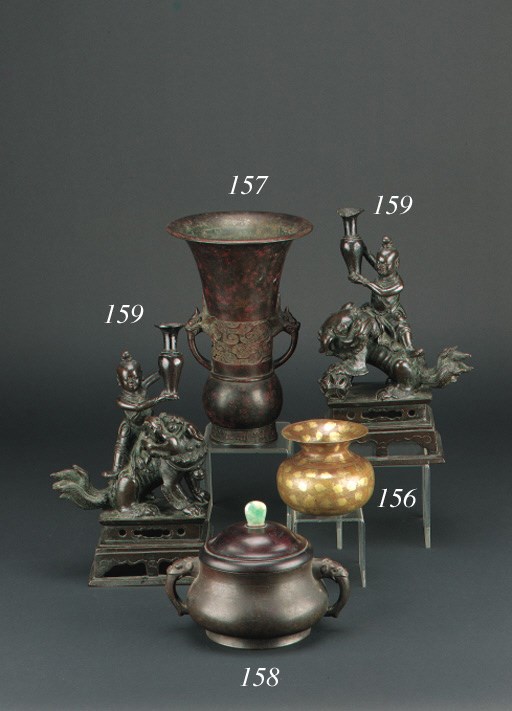 A pair of late Ming bronze incense holders