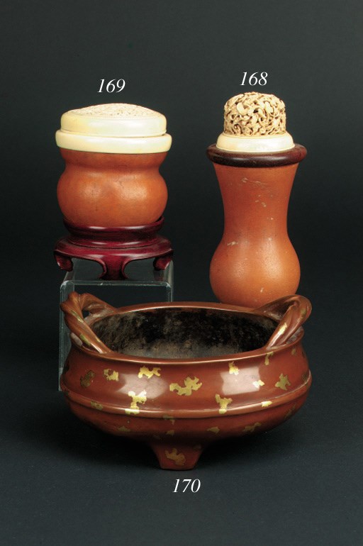 A Chinese bronze gold splash tripod censer