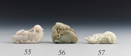 A SPECKLED GREY AND WHITE JADE BIRD GROUP