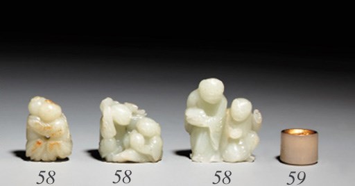 AN IMPERIAL WHITE JADE ARCHER'S RING