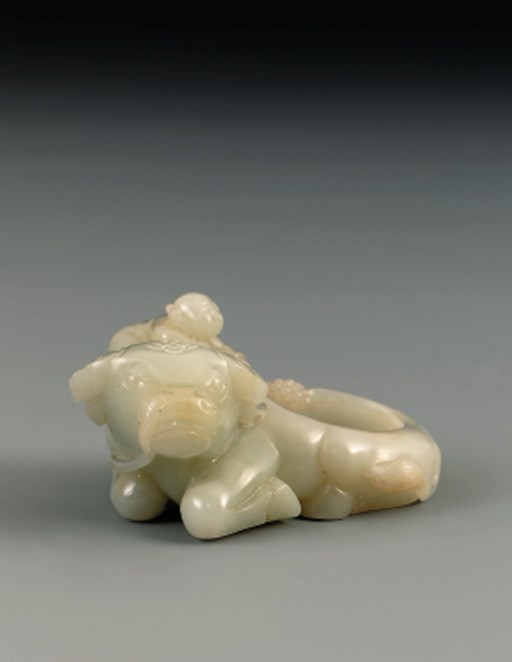 A WHITE JADE 'BOY AND BUFFALO' BRUSHWASHER