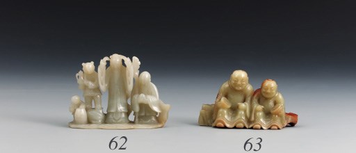A YELLOW JADE GROUP OF THE HEHE ERXIAN