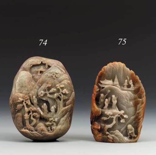 A CELADON AND RUSSET JADE BOULDER