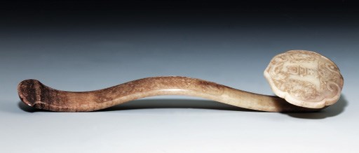 A BURNT GREY JADE RUYI SCEPTRE