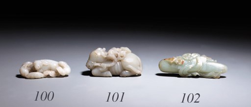 A WHITE JADE RAM GROUP