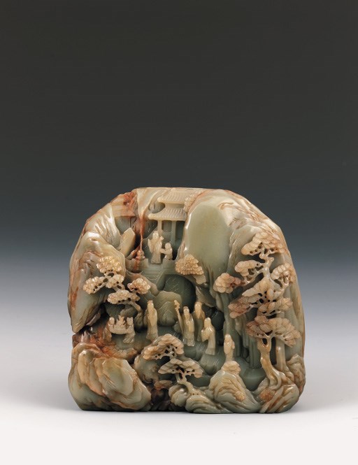 A FINE CELADON AND RUSSET JADE BOULDER