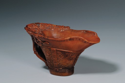 A RHINOCEROS HORN LIBATION CUP