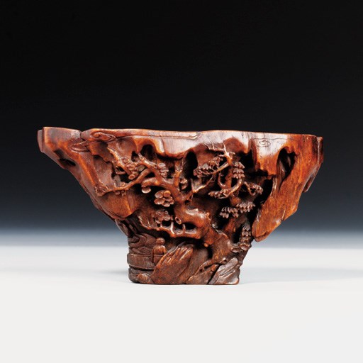 A RHINOCEROS HORN LIBATION CUP